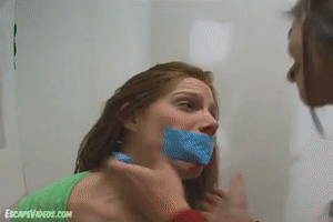 www.escapevideos.com - Stacie Snow Tape Gagged Fondled 2 thumbnail